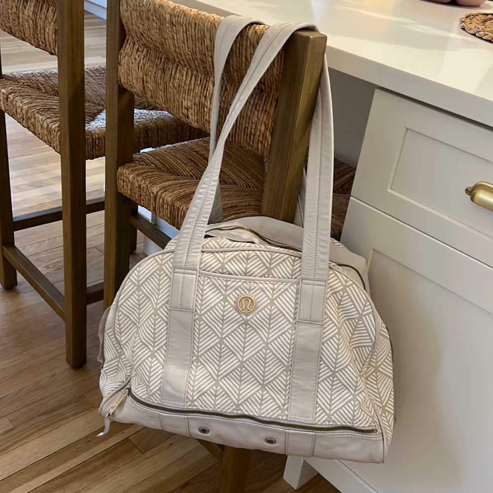 Tan and white lululemon bag